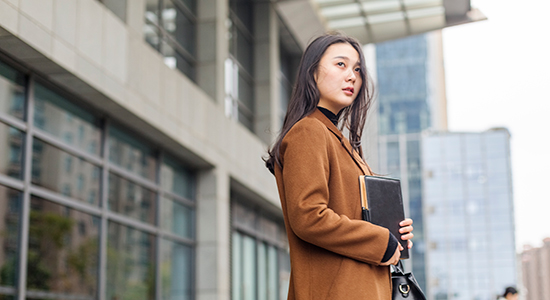 woman leaving office