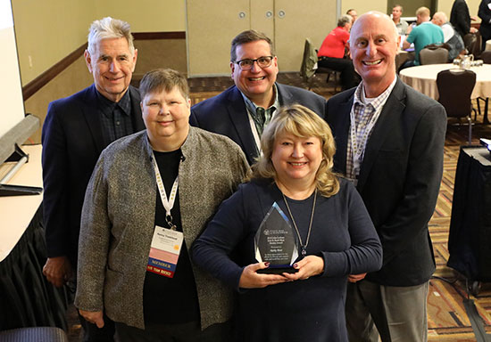 Kathy Brost with Lederer Award