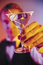 Bartender holding a Martini