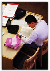 Law Student at Desk - Photo Courtesy of Jeff Miller/University Communications