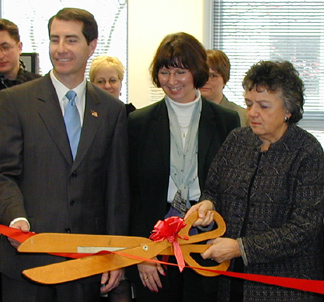 Waukesha County Executive Daniel Finley and       Shirley Abrahamson cuts the ribbon at the Waukesha County Family Court       Self-help Center.