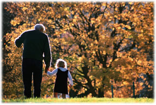 man and child walking