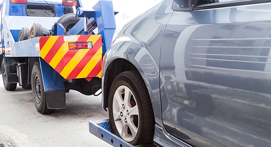 tow truck and car