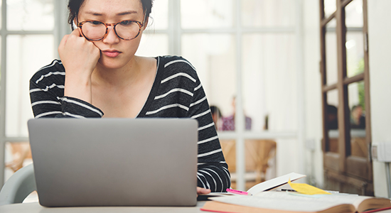 woman sitting at computer