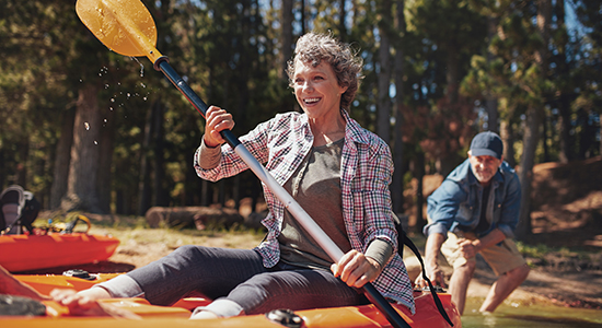 elderly woman kayaking