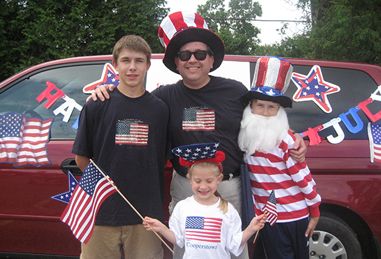 Larry with children Michael, Samuel, and Mary Kate Martin