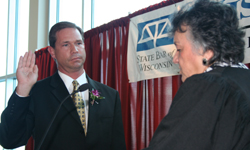 State Bar of Wisconsin   President-elect James Boll is sworn in by Chief Justice Shirley S.   Abrahamson.