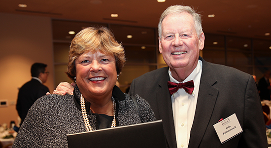 New Fellow Hon. Mary M. Kuhnmuench with her husband