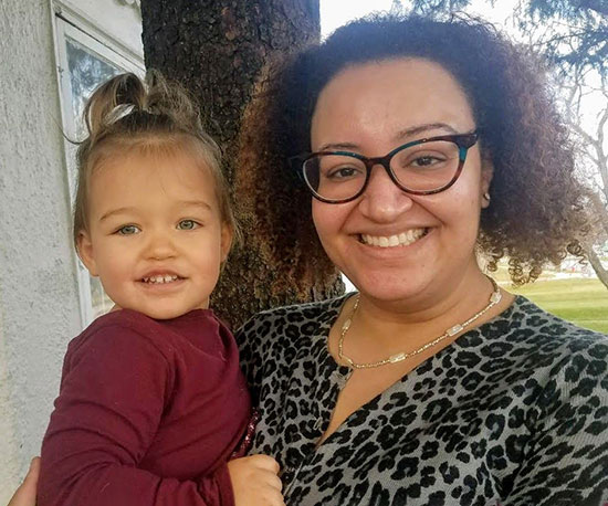 Amber Raffeet August with her daughter