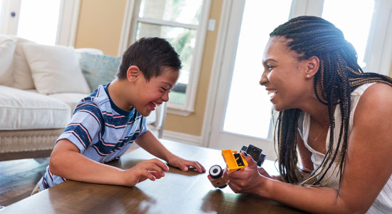 adopted child plays with parent