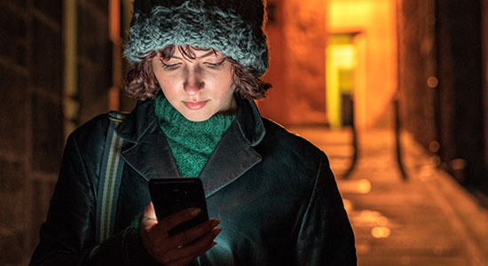 woman looking at phone