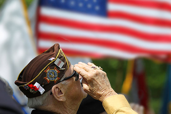 veteran saluting flag