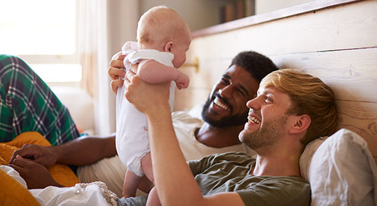 two parents with baby