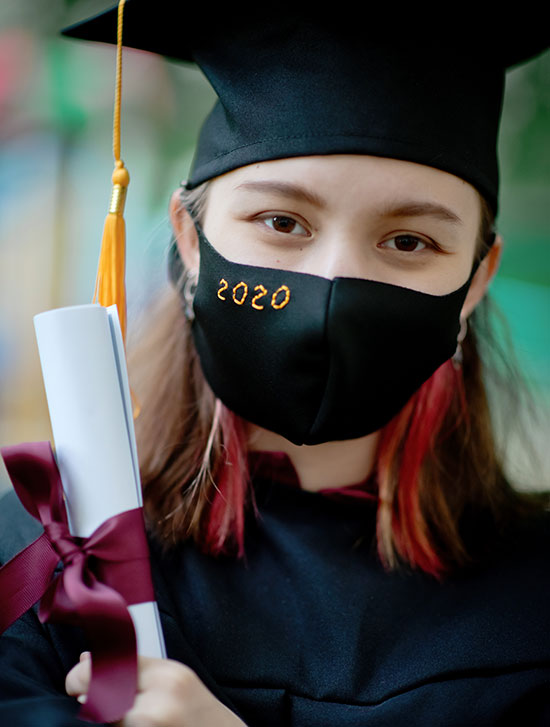graduate in facemask