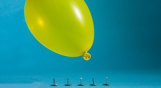 balloon over tacks