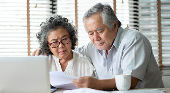 concerned elderly couple