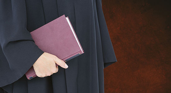 judge holding law book