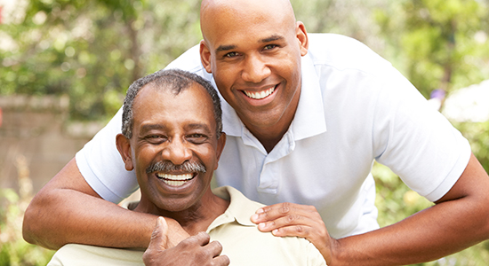 Adult son with elderly parent