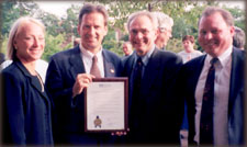 Photo: From left: State Bar           President     Pat Ballman; Rep. Mark Green, who was recognized for his         assistance     in procuring a federal district court in Green Bay; Past         President     Gerry Mowris; and President-elect George Burnett. 