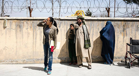 Kimberley Motley with Afghan family