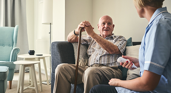 elderly man gets health check up